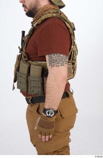 Photos Luis Donovan Contractor arm bulletproof vest upper body watch…